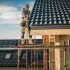 construction-worker-performing-roof-installation.jpg